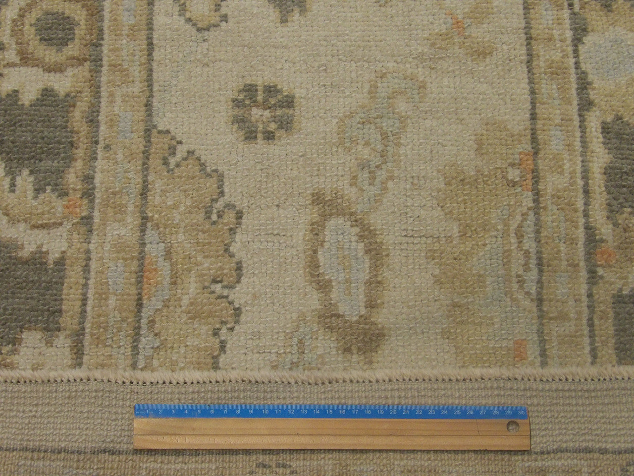 Gray & Beige Vintage Oushak rug in room setting