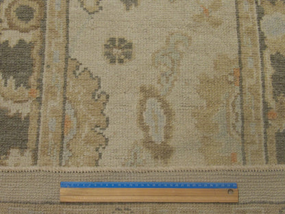 Gray & Beige Vintage Oushak rug in room setting