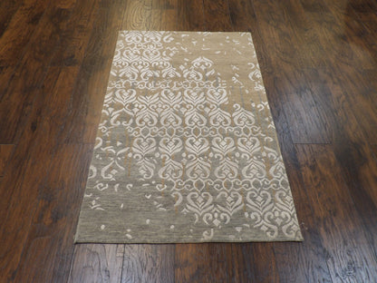 Back of hand-knotted modern broken design rug showing construction
