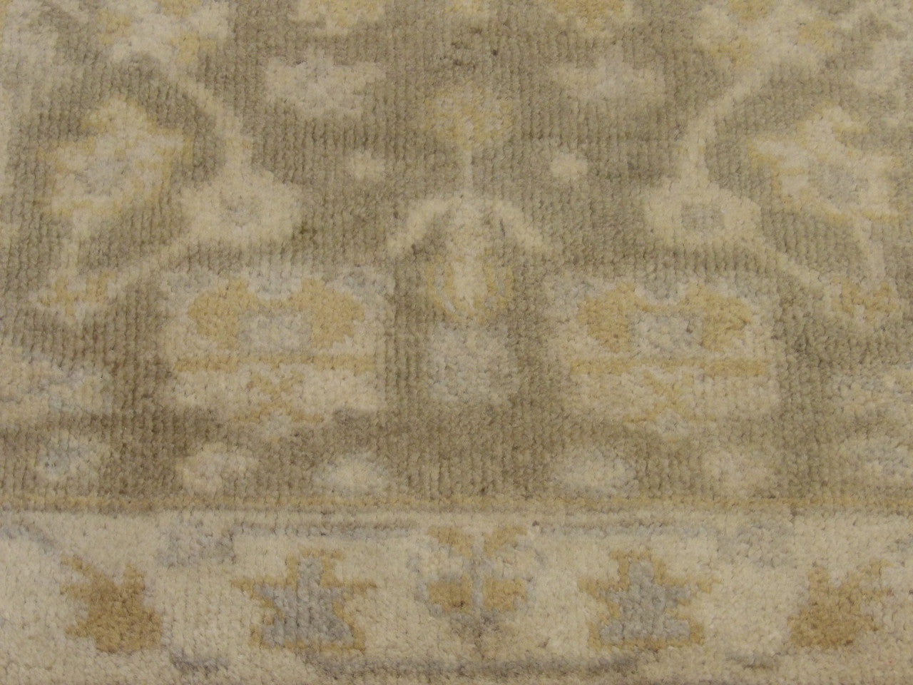 Oushak runner border detail, green and beige