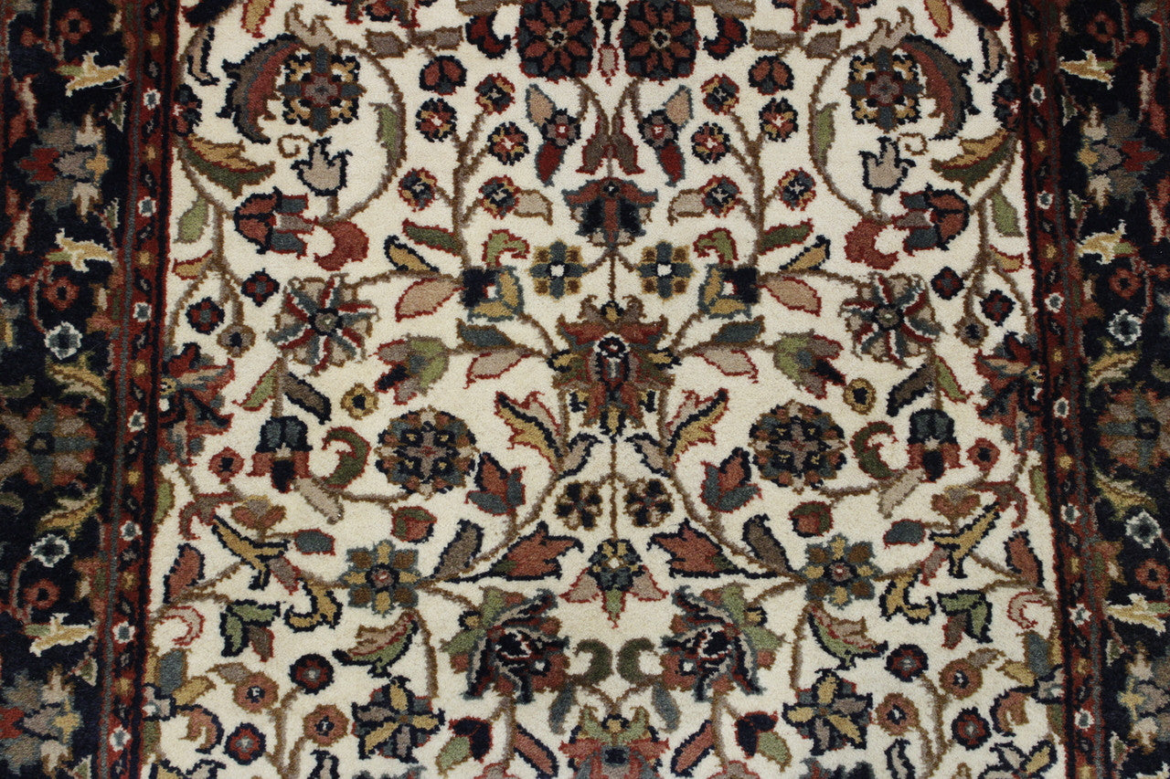 Traditional Fine Mashad rug corner detail
