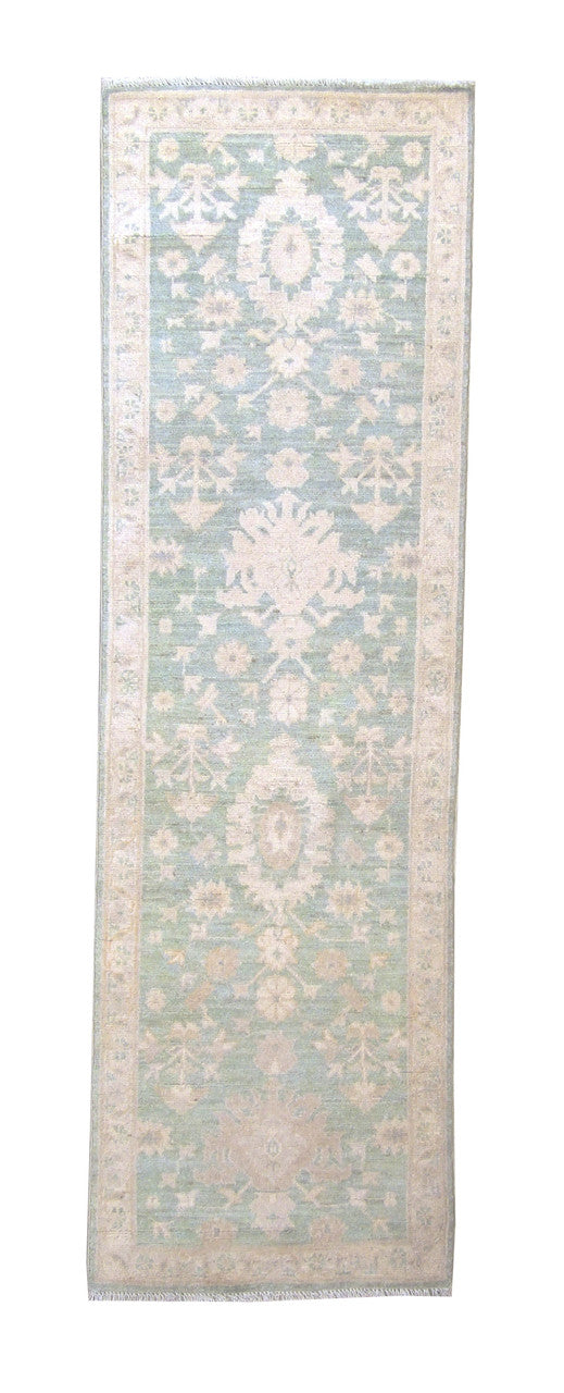 Oushak Chobi hand-knotted wool rug in Green, full view