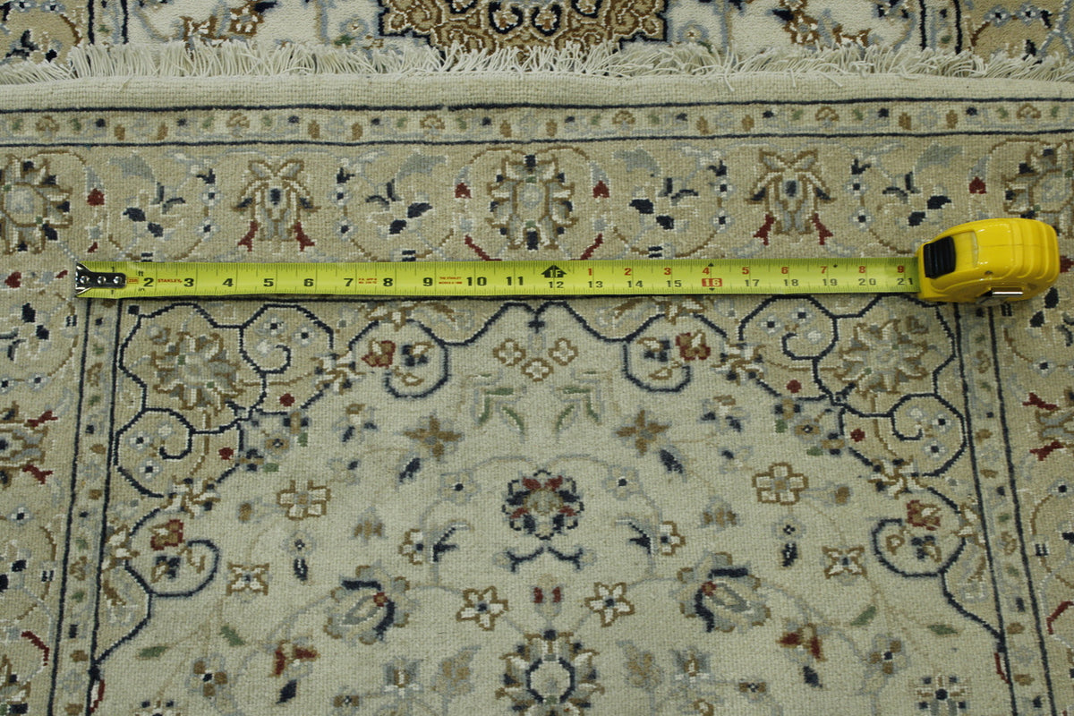 Traditional Fine Nain hand-knotted wool-silk rug in Beige, full view