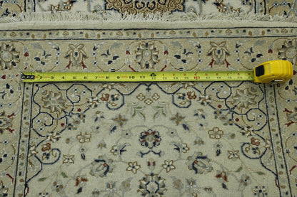 Traditional Fine Nain hand-knotted wool-silk rug in Beige, full view