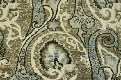 Beige, Brown & Blue Oushak Ikat Chobi rug in room setting