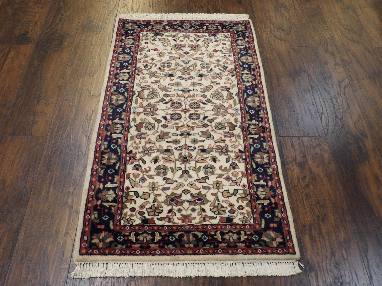 Back of hand-knotted Kashan rug showing construction