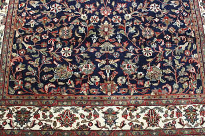 Blue & Beige Traditional Fine Heraki rug in room setting