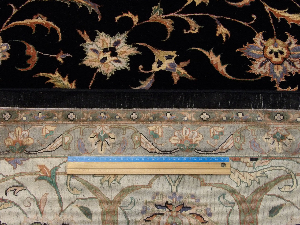 Black Fine Persian Kashan rug in room setting