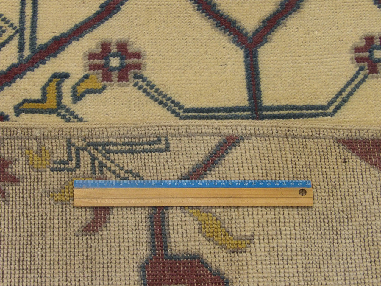 Full room view of natural Ziegler hand-knotted rug