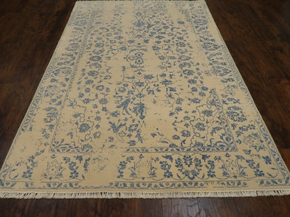 Close-up of wool-silk pile, blue and ivory rug
