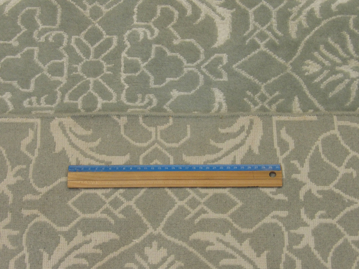 Blue and gray abstract rug in room setting