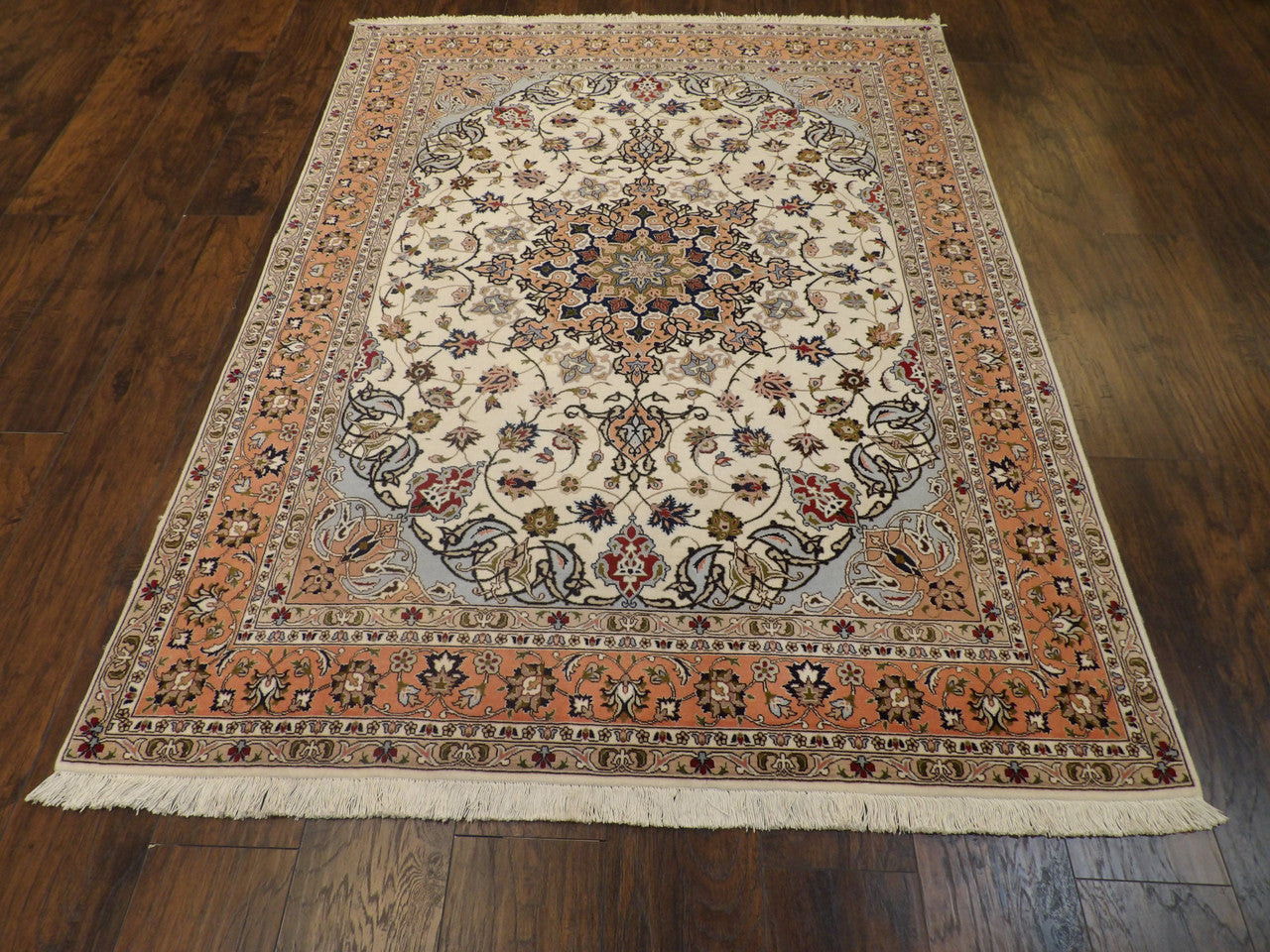 Fine Persian Qum rug corner detail