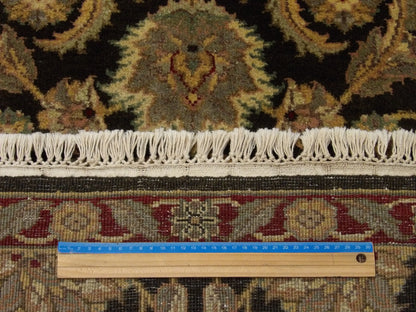 Green and red Jaipur Kashan runner in hallway setting