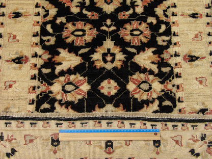 Black & Gold Oushak Chobi Natural Dye rug in room setting