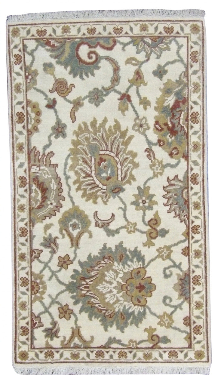 Oushak hand-knotted wool rug in Ivory, full view
