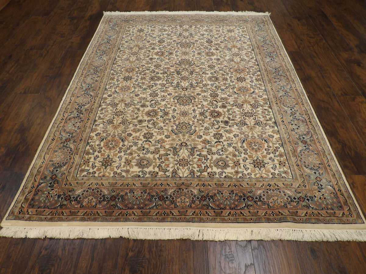 Close-up of wool pile, blue and ivory rug