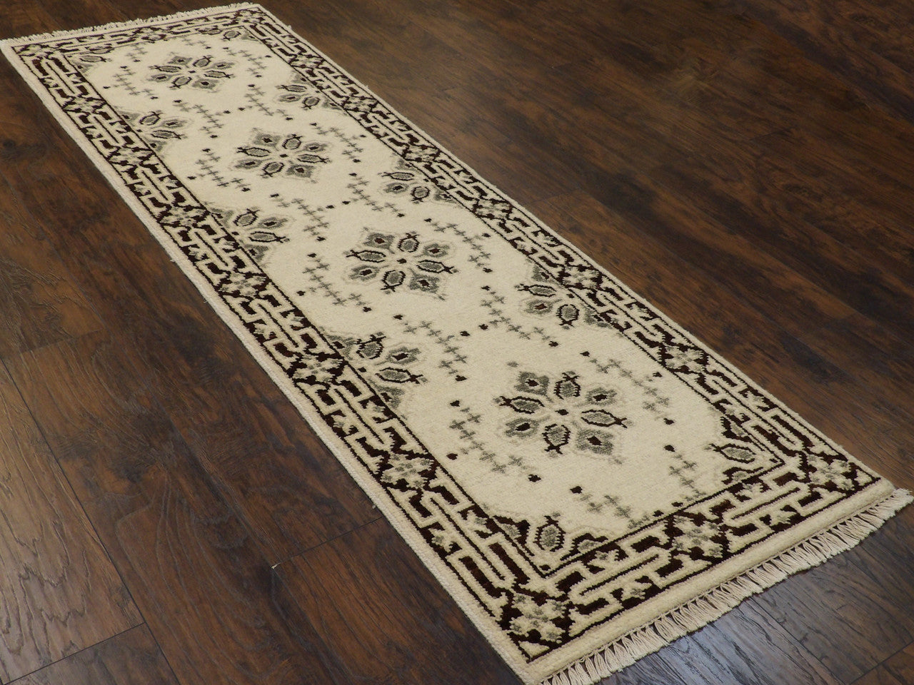 Beige and brown Tribal Heriz runner in a hallway setting