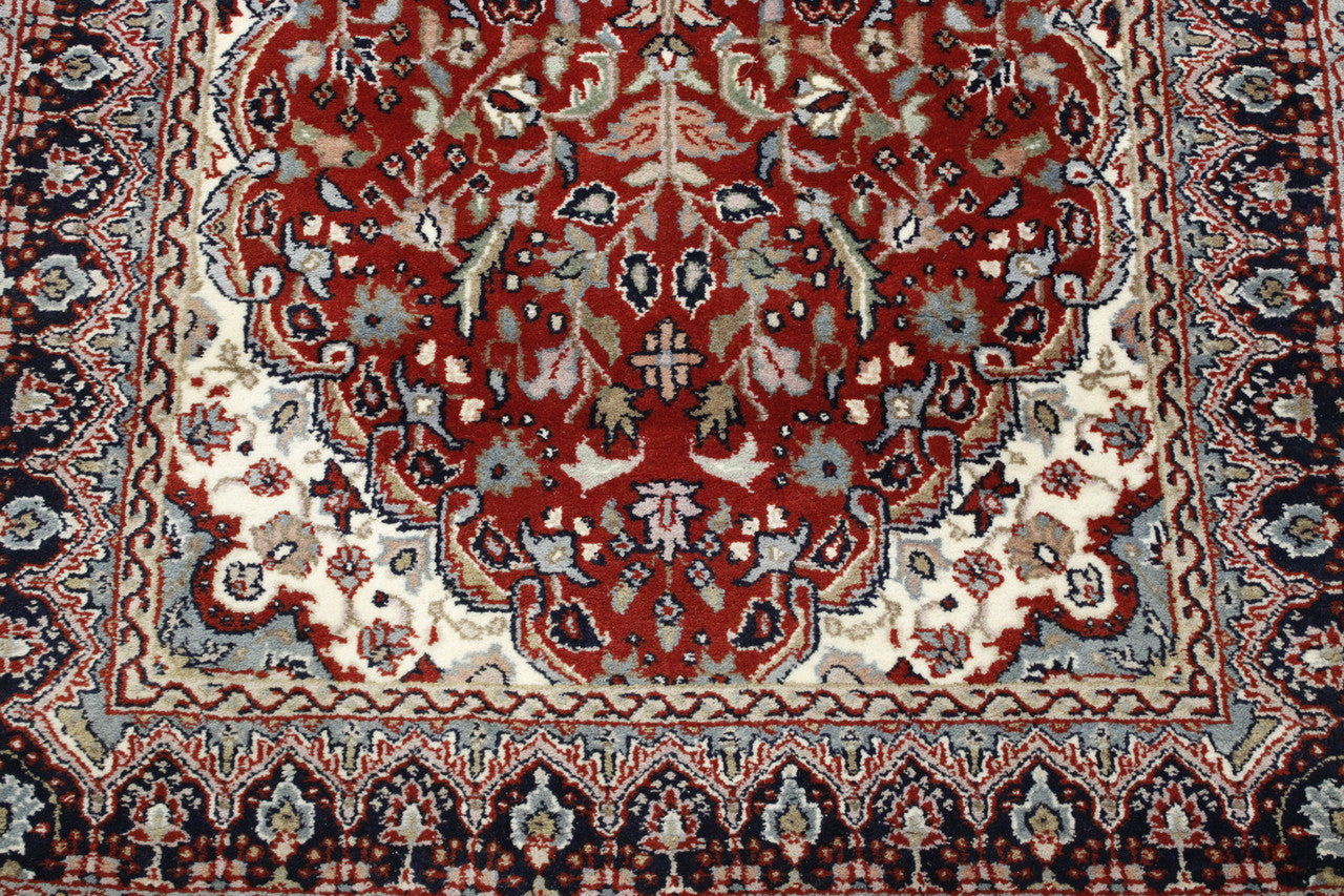 Traditional Fine Tabriz rug border detail