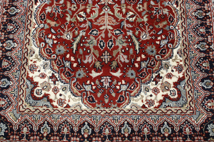 Traditional Fine Tabriz rug border detail