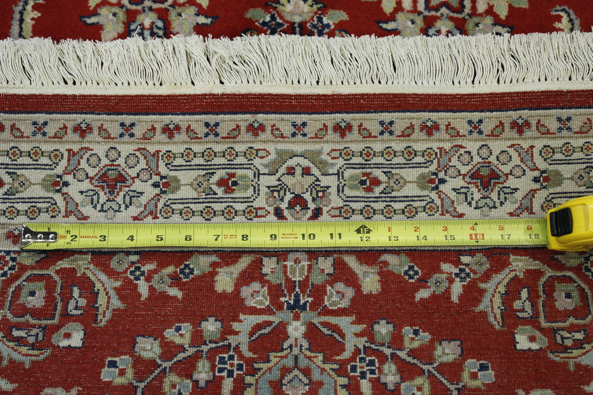 Beige & Red Traditional Indo Sharookh rug in room setting