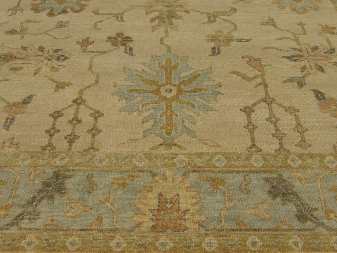Anatolian Oushak rug border detail, beige and blue