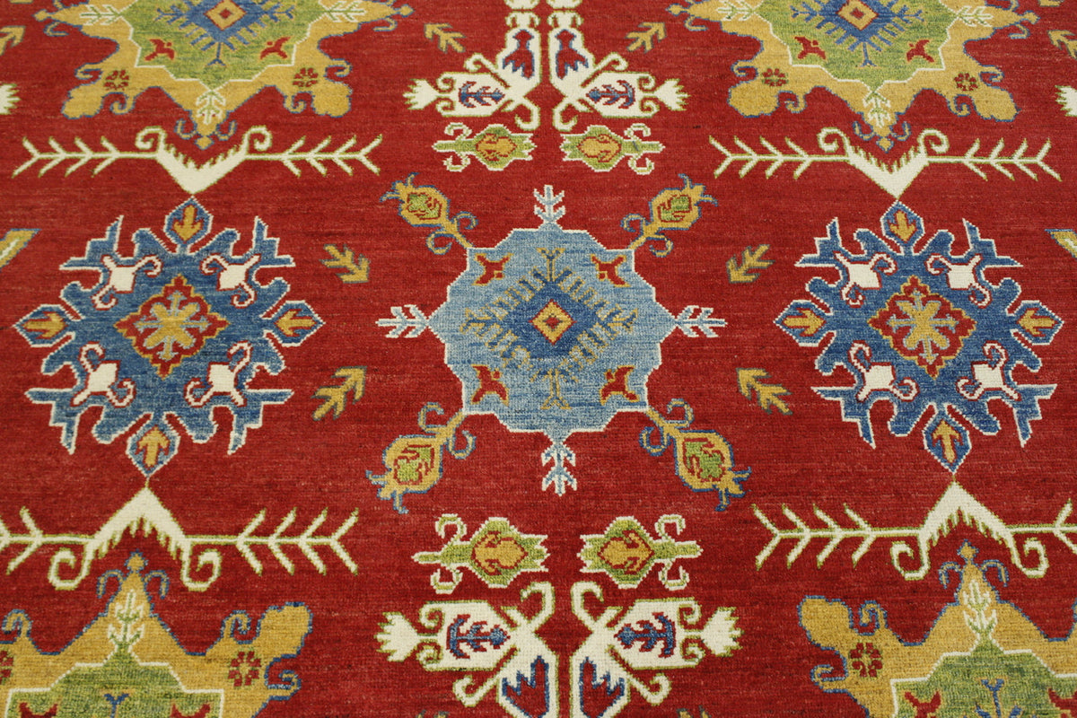 Beige & Red Tribal Super Kazak rug in room setting
