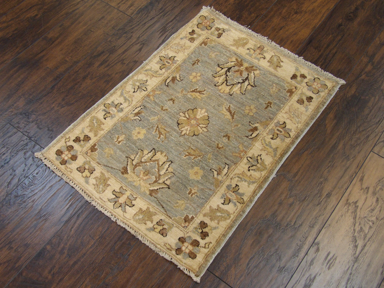 Chobie pattern detail, beige and blue accent rug
