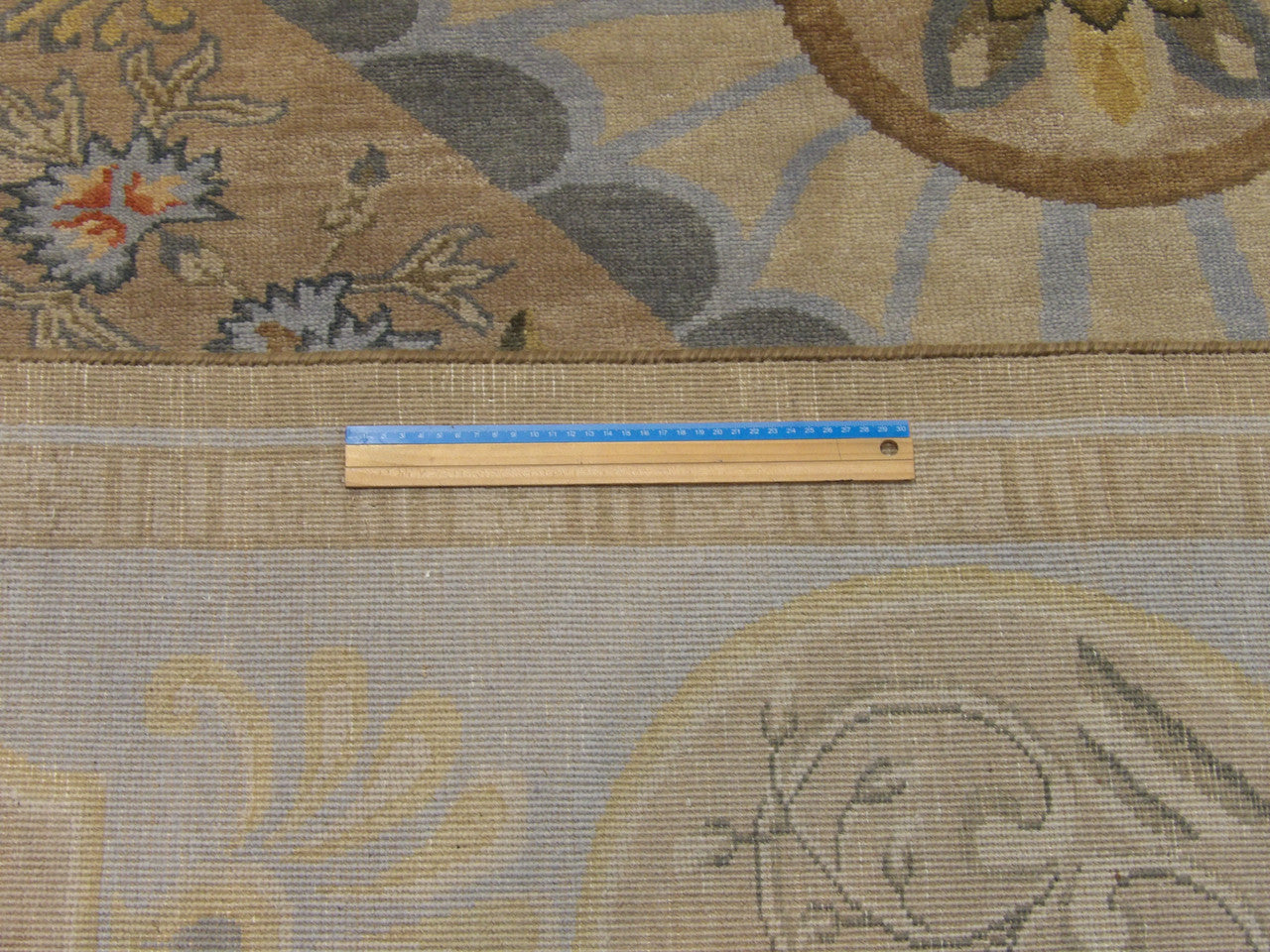 Blue & Brown European Abusson rug in room setting