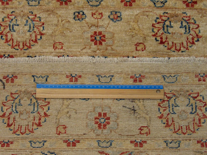 Beige Oushak Chobi rug in room setting