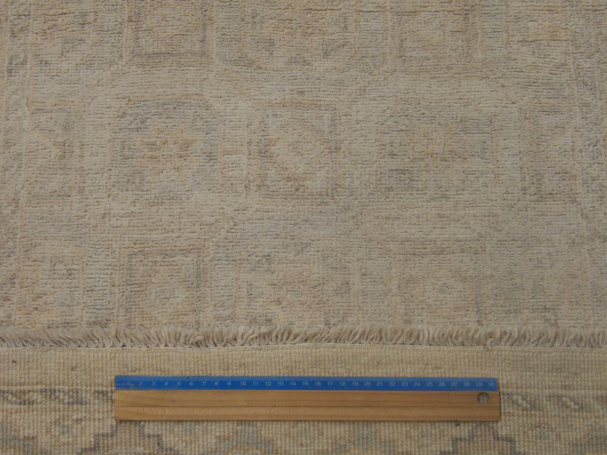 Ivory Oushak Chobi Wash rug in room setting