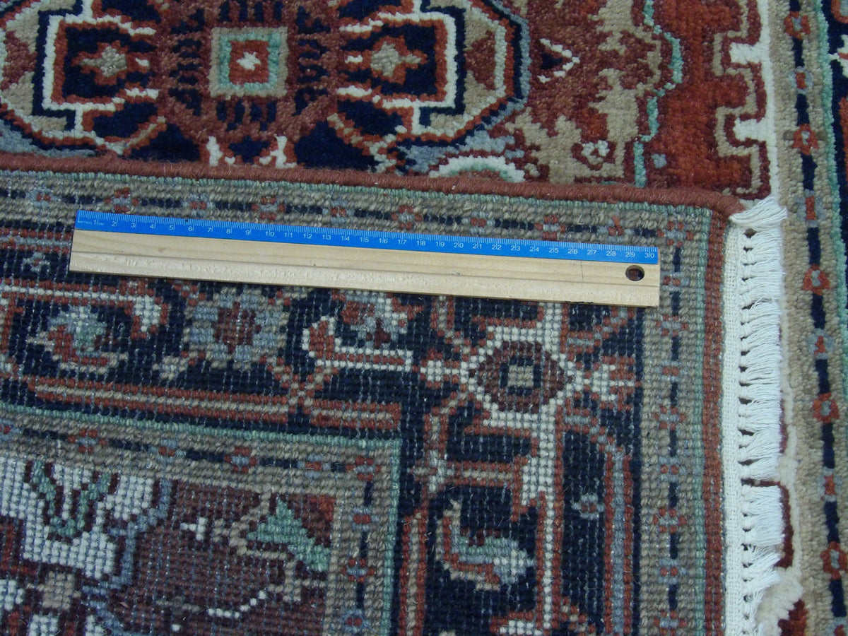 Blue & Red Tribal Sherapi rug in room setting