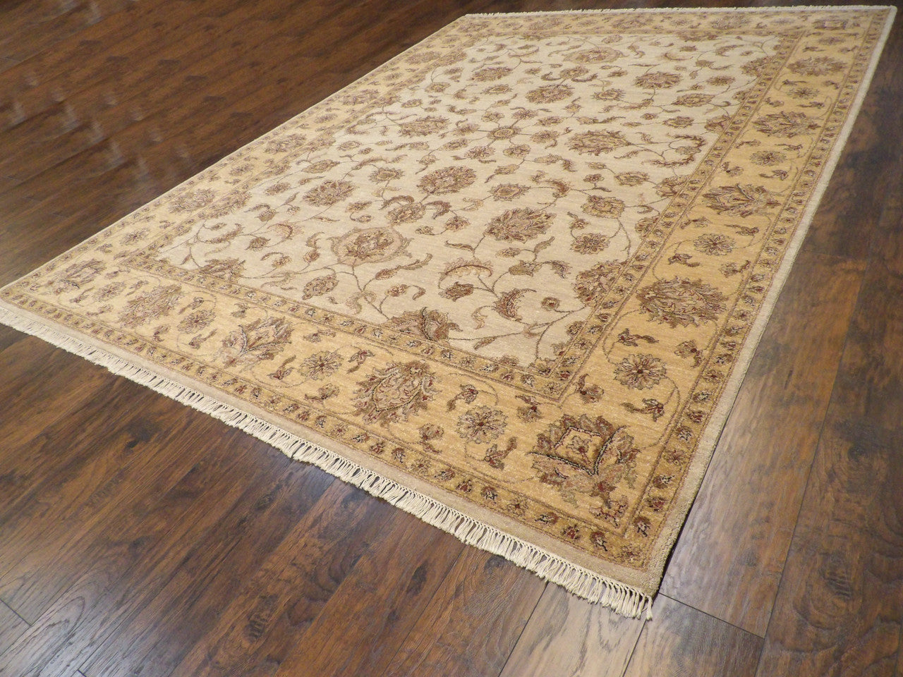 Ziegler pattern detail on beige and gold hand-knotted rug