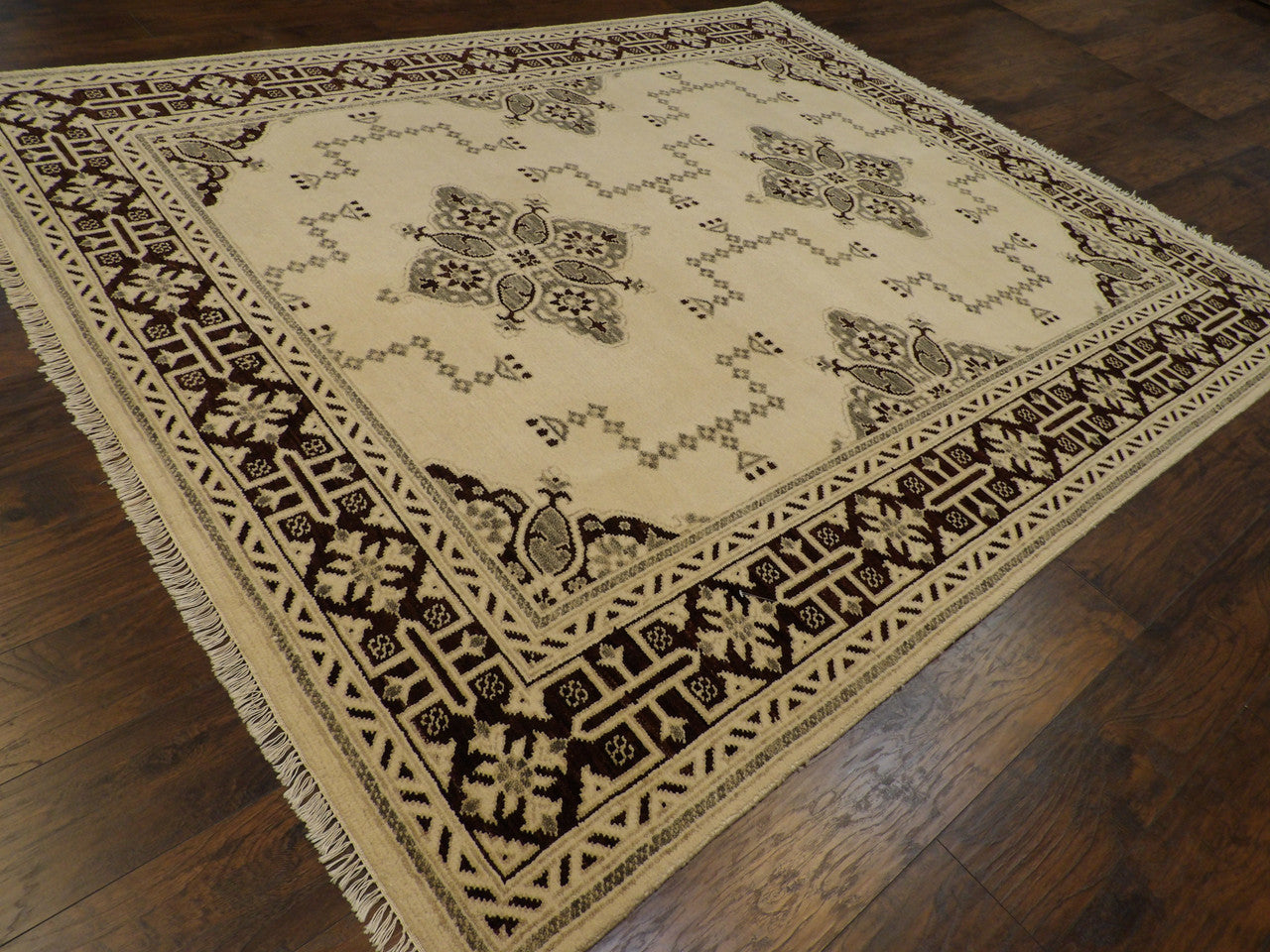 Brown and ivory Oushak Kazak rug in a living room setting