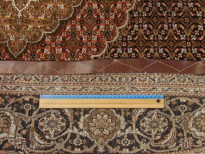 Full room view of Persian Mahi Tabriz hand-knotted rug