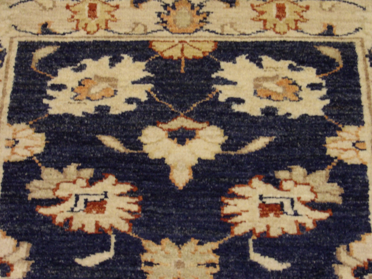 Wool texture close-up, blue and beige Oushak runner