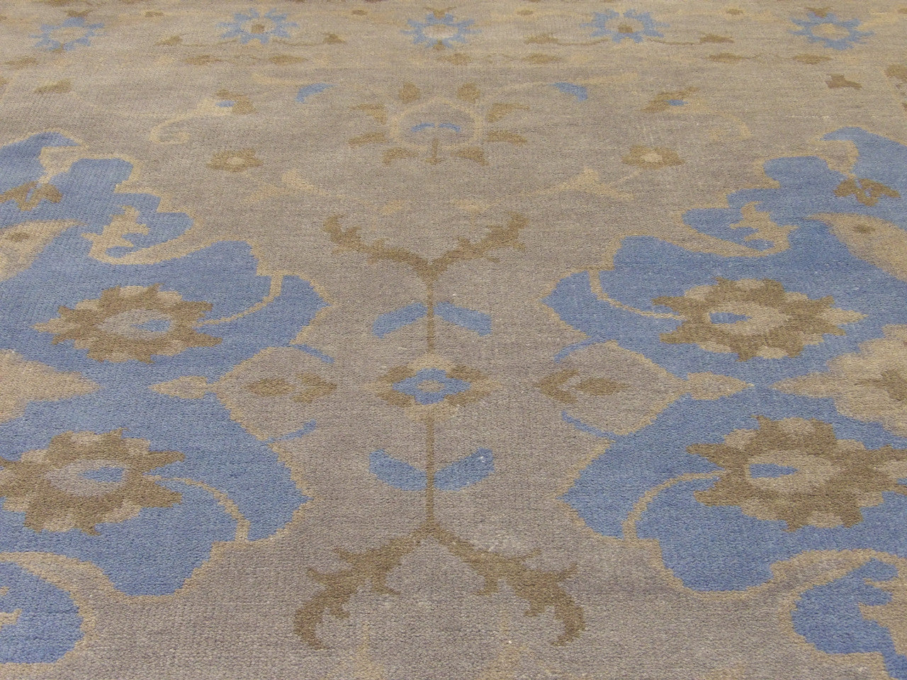 Back of Oushak hand-knotted rug