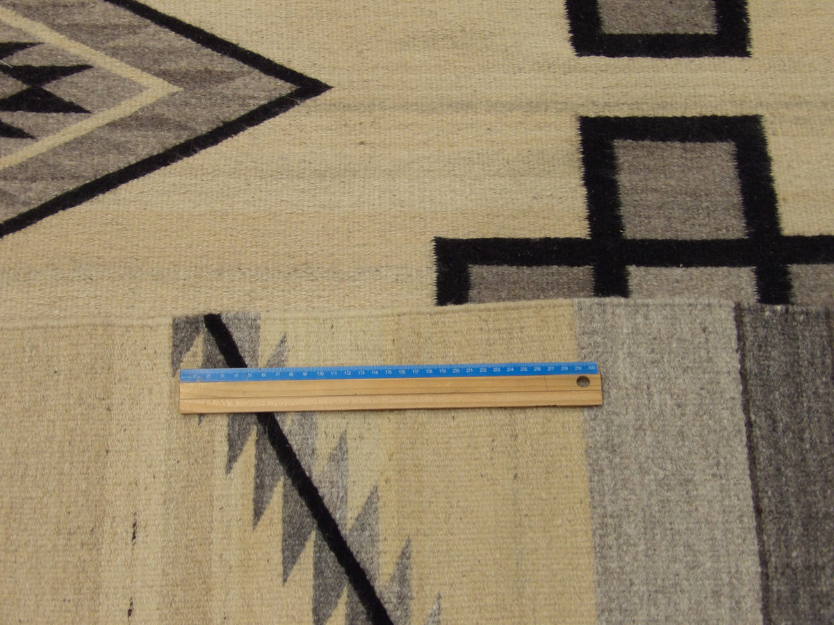 Ivory & Black American Indian Flat Weave Durry rug in room setting