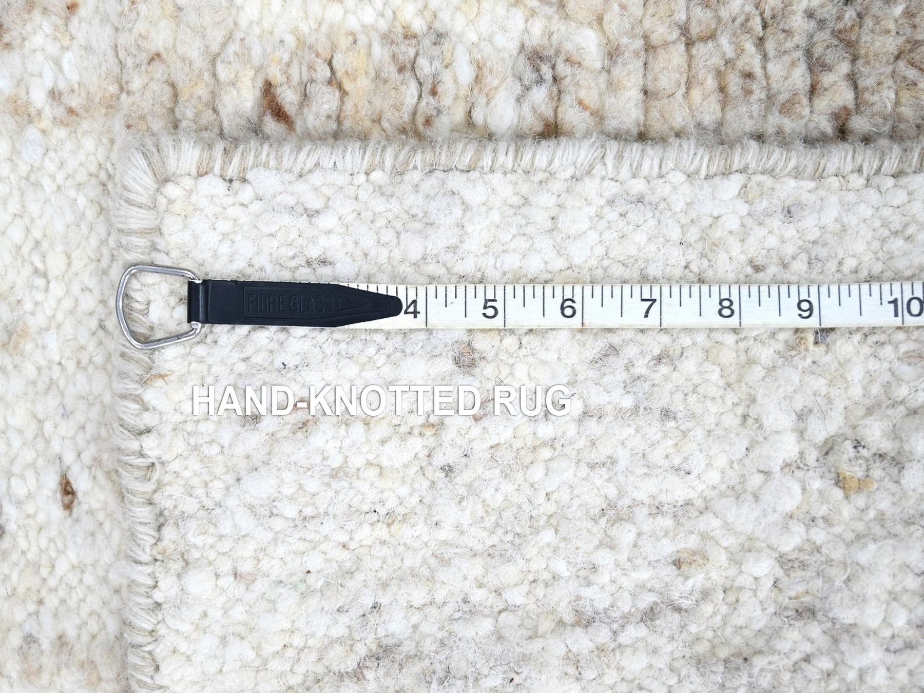 Modern / Contemporary hand-knotted wool rug in Ivory, 2' x 2'9" — SKU O010346 (view 7)