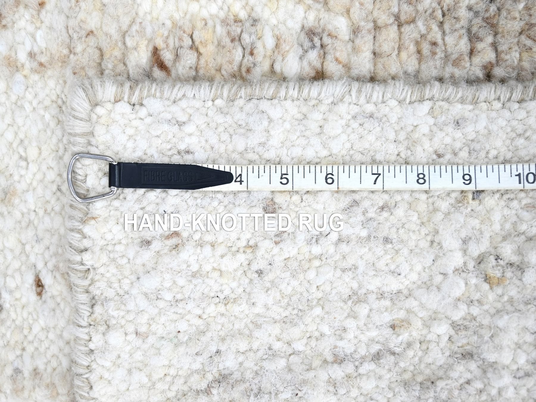 Modern / Contemporary hand-knotted wool rug in Ivory, 2' x 2'11" — SKU O010348 (view 7)