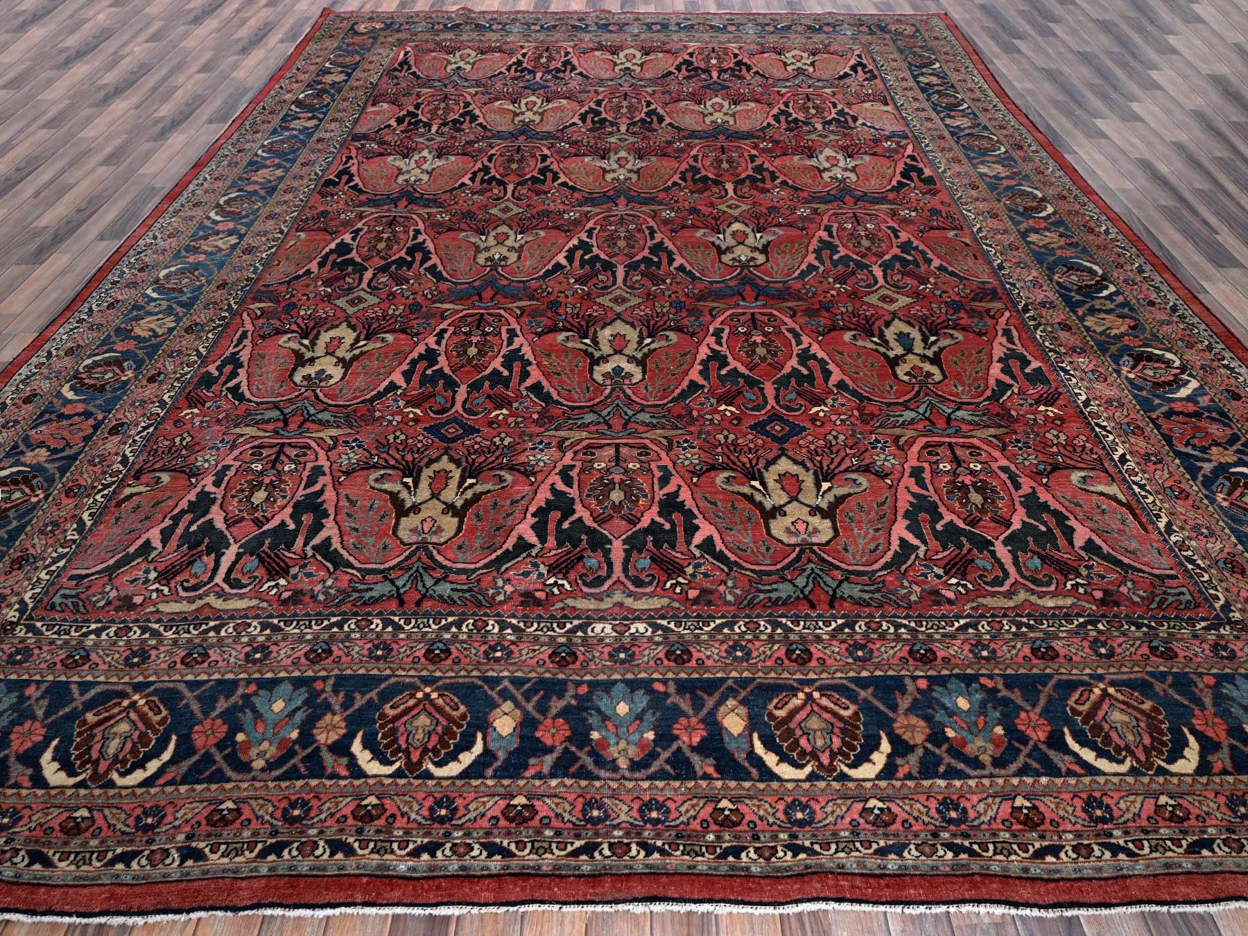 Antique hand-knotted wool rug in Red & Midnight Blue, 11'3" x 14'5" — SKU O01373 (view 2)