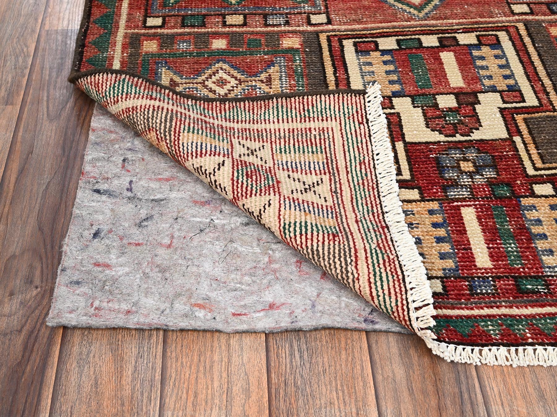 Vintage hand-knotted wool runner in Red, 3'1" x 6'7" — SKU O01546 (view 3)