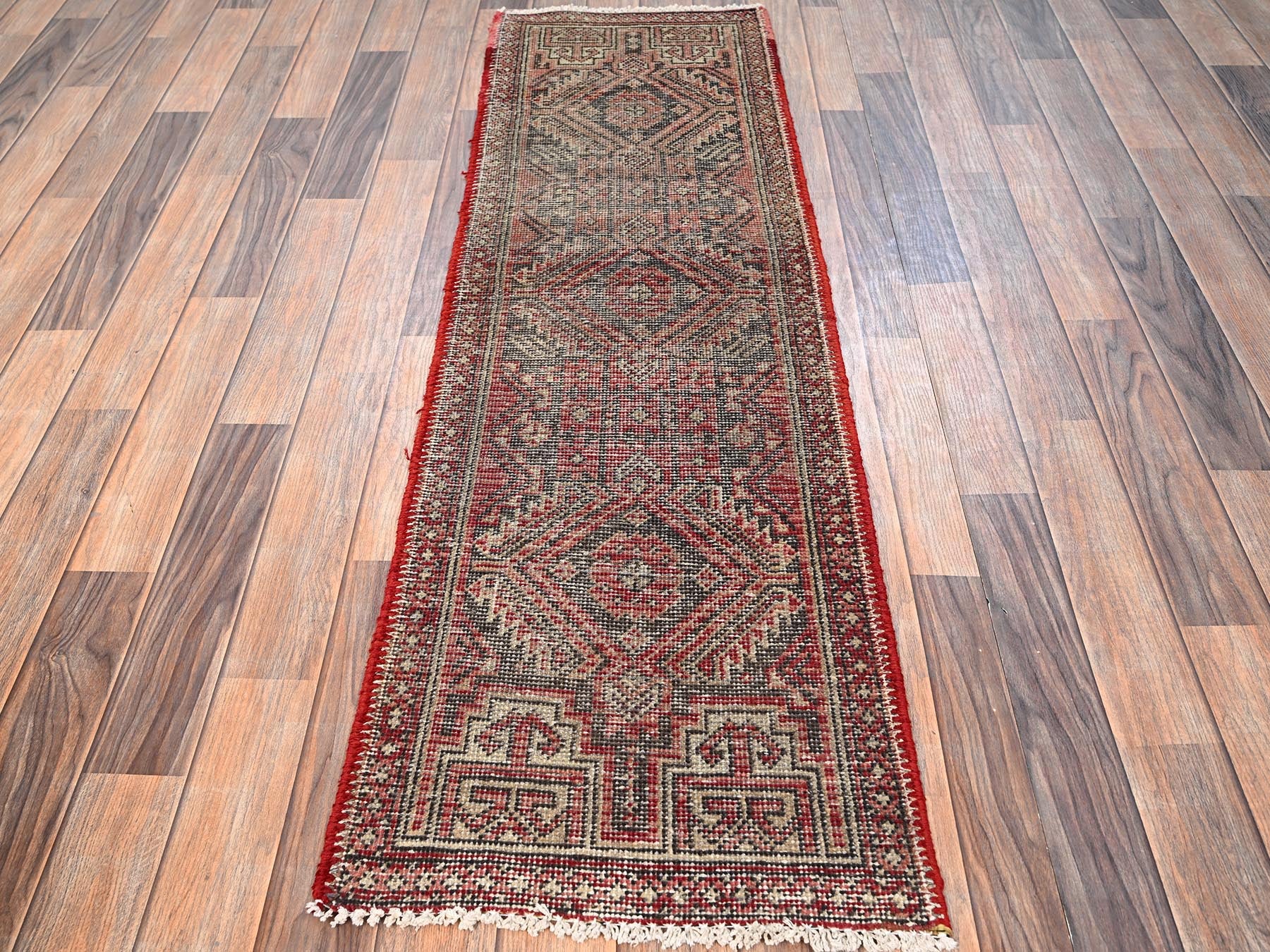 Vintage hand-knotted wool runner in Red, 1'10" x 5'8" — SKU O01560 (view 2)