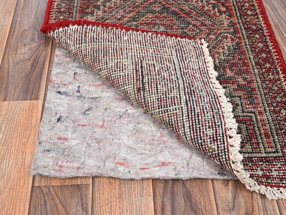 Vintage hand-knotted wool runner in Red, 1'10" x 5'8" — SKU O01560 (view 3)