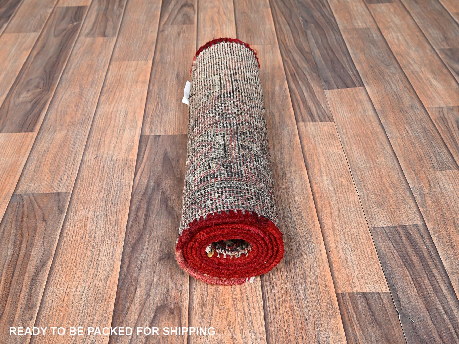 Vintage hand-knotted wool runner in Red, 1'10" x 5'8" — SKU O01560 (view 5)