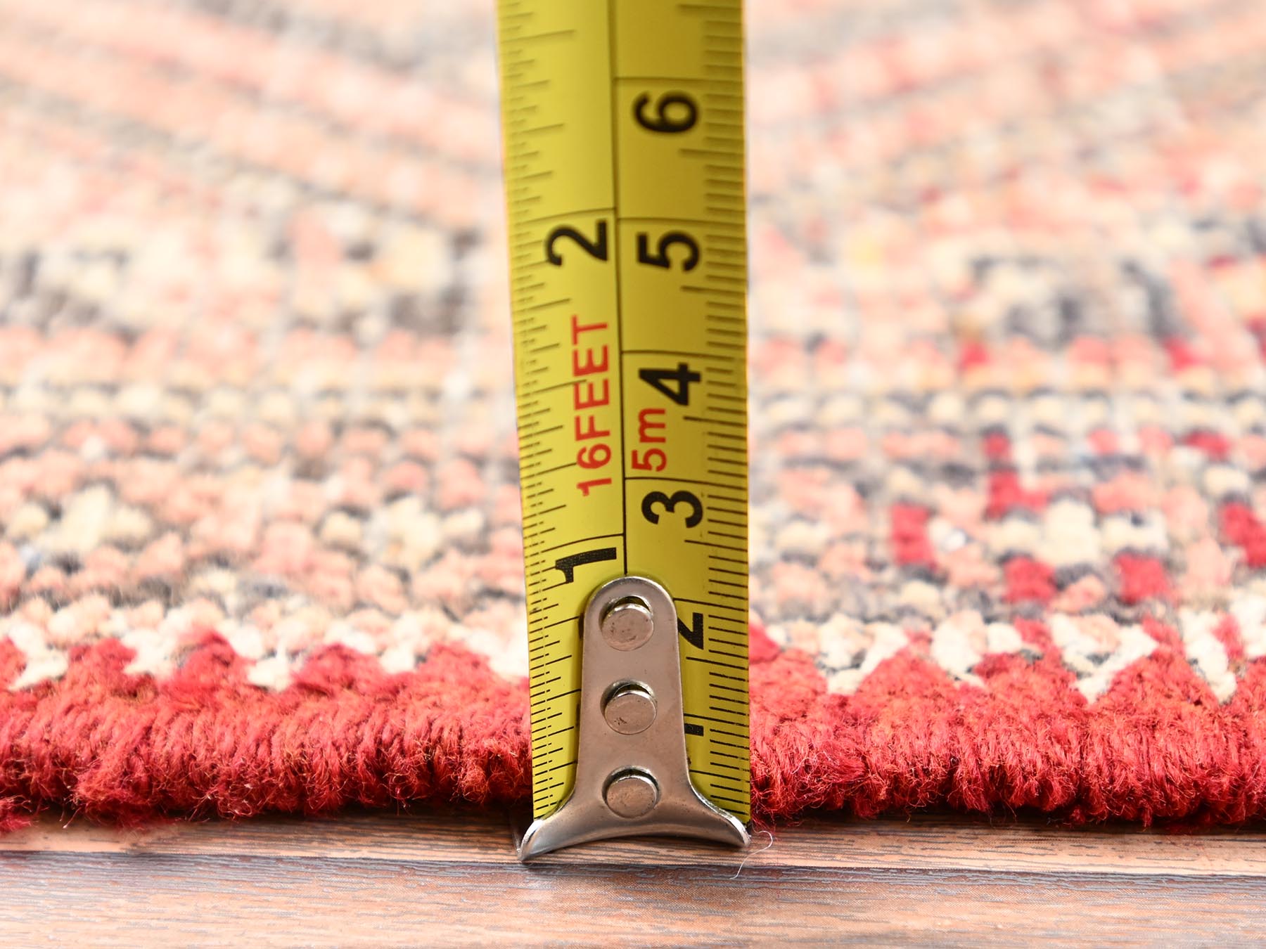 Vintage hand-knotted wool runner in Red, 1'10" x 5'8" — SKU O01560 (view 6)