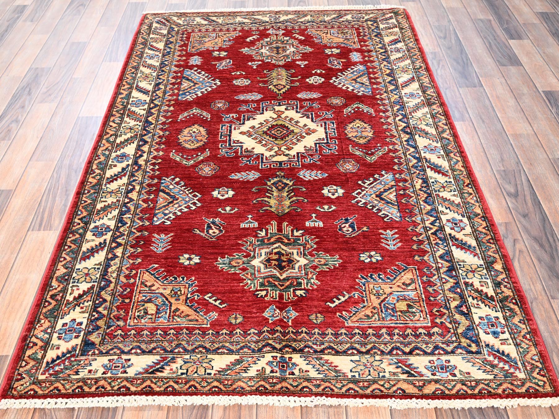 Kazak Kazak hand-knotted wool rug in Red & Ivory, 4'1" x 6'5" — SKU O01828 (view 2)