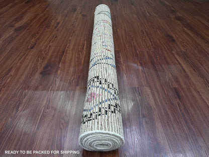 Tribal & Geometric hand-knotted wool rug in Ivory, 5'5" x 8'11" — SKU O020347 (view 4)