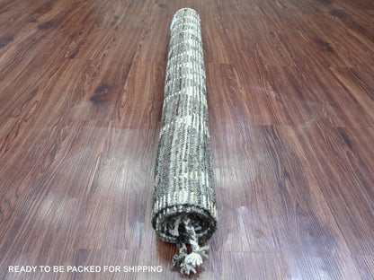 Brown 4'1" x 5'6" Tribal Hand knotted Wool Rug - Sku: O020745
