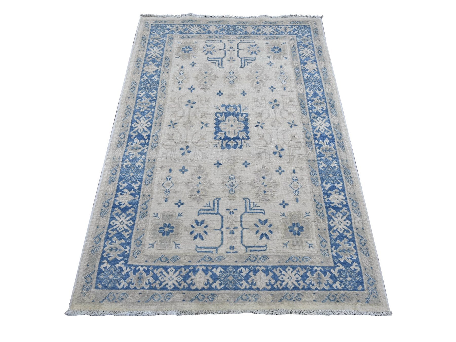 Kazak Kazak hand-knotted wool rug in Ivory & Blue, 3'10" x 5'6" — SKU O021925
