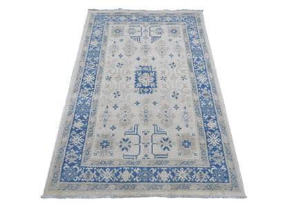 Kazak Kazak hand-knotted wool rug in Ivory & Blue, 3'10" x 5'6" — SKU O021925